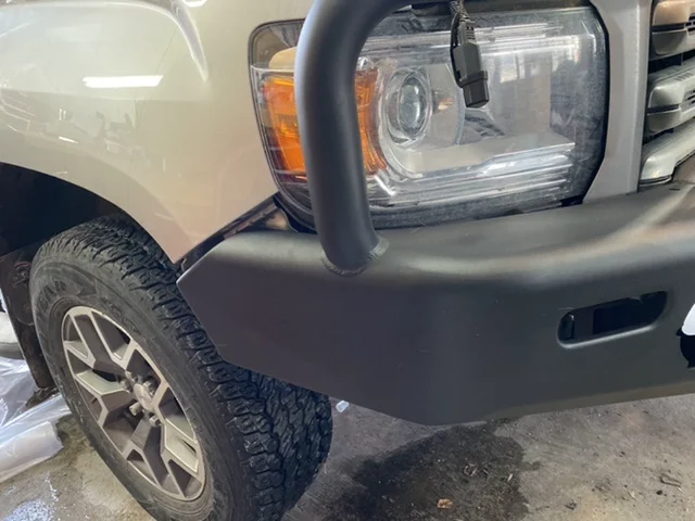 Gap between ARB bumper and factory lights showing minimal trim needed