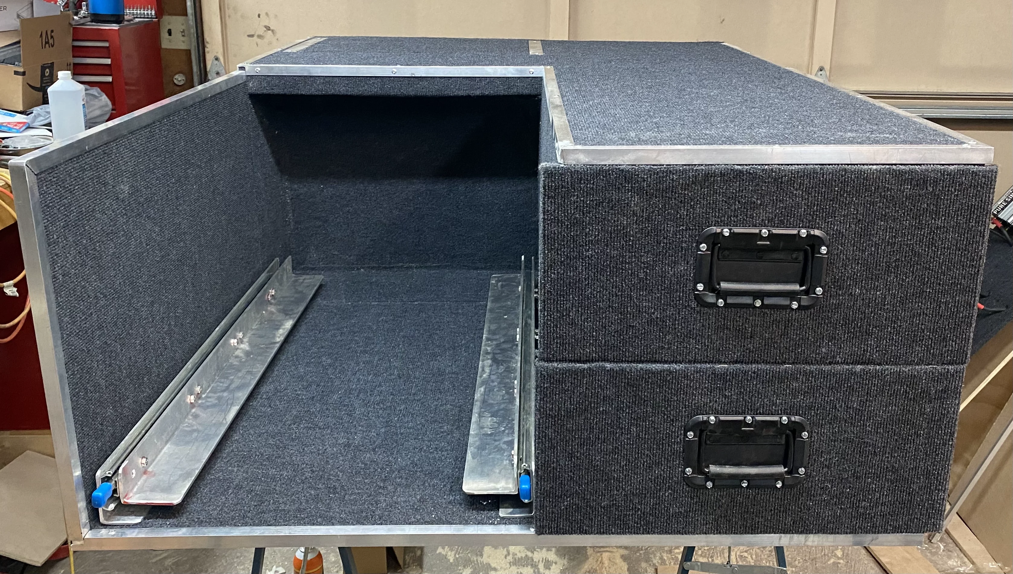 Completed drawer unit with carpet covering