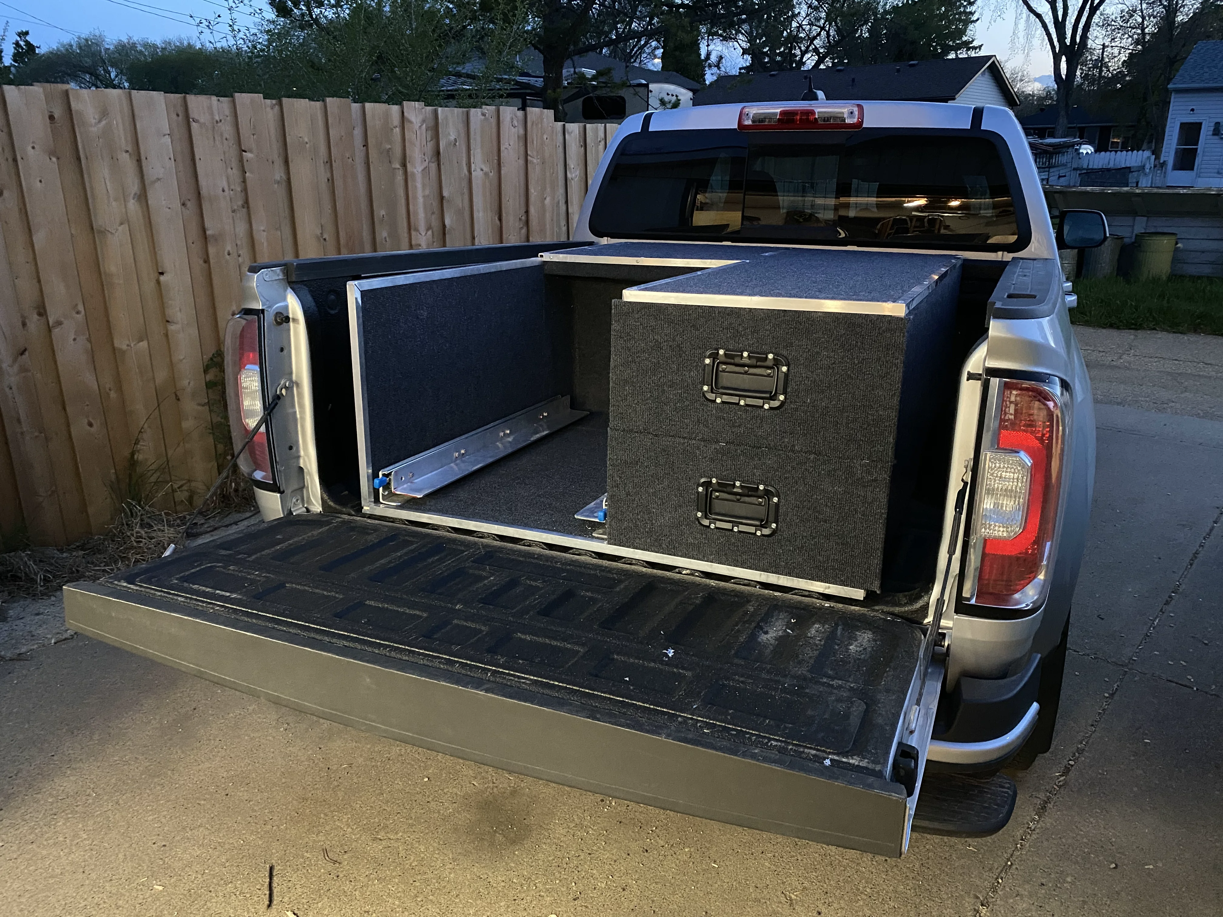 Another view of carpeted drawer unit with aluminum trim