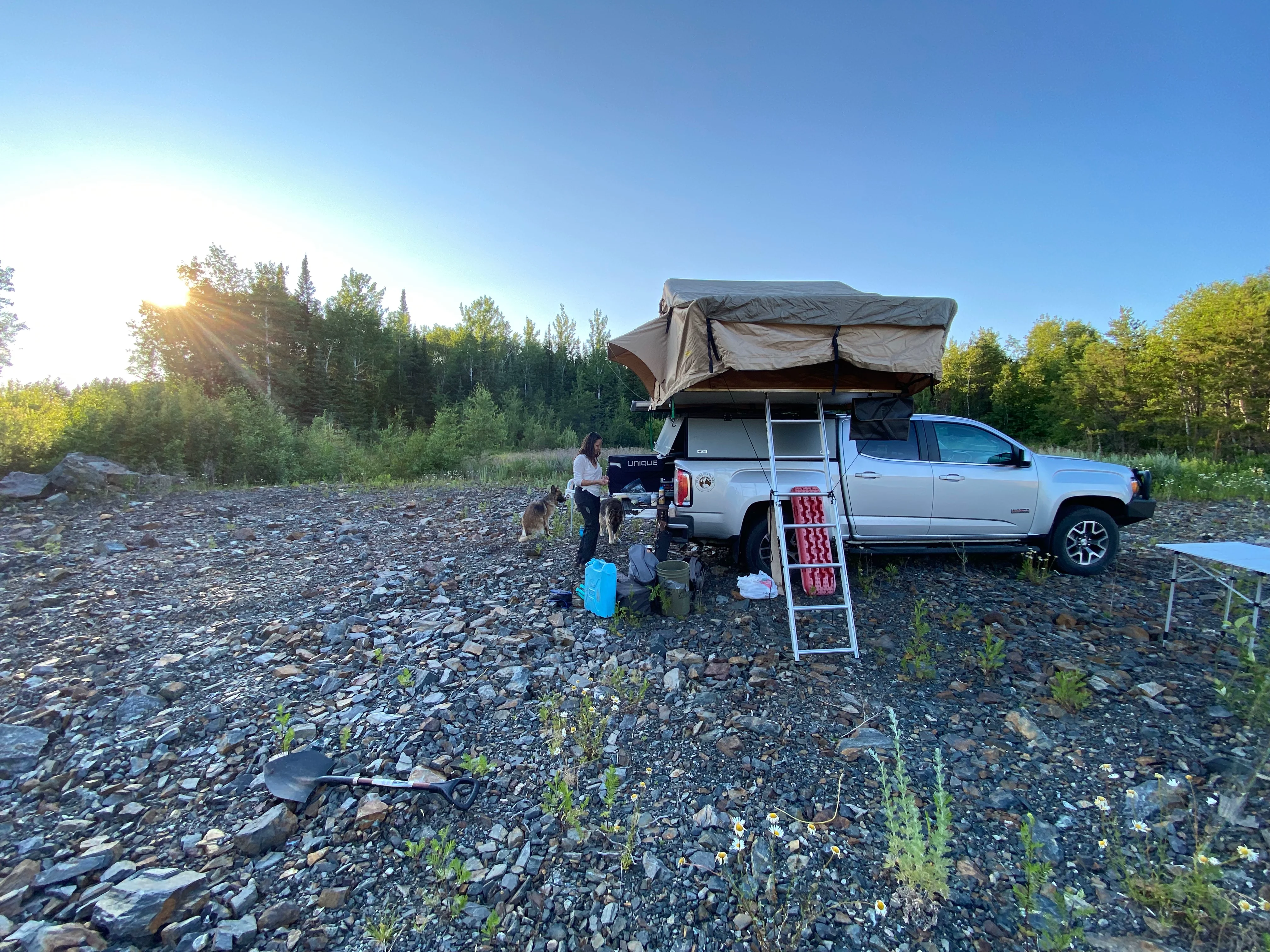 Pac with rooftop tent deployed at sunset